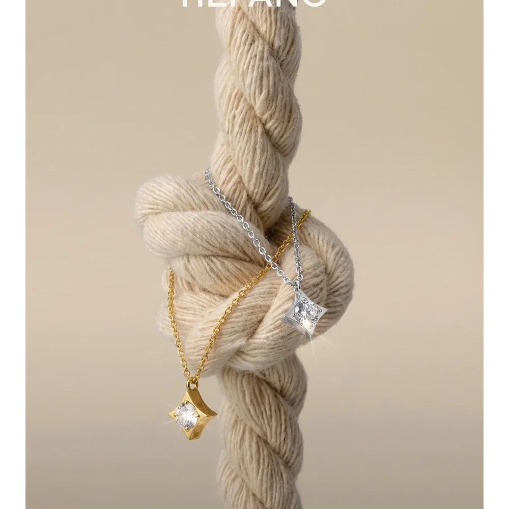 Cubic zirconia star necklace in gold-plated stainless steel with cubic zirconia.