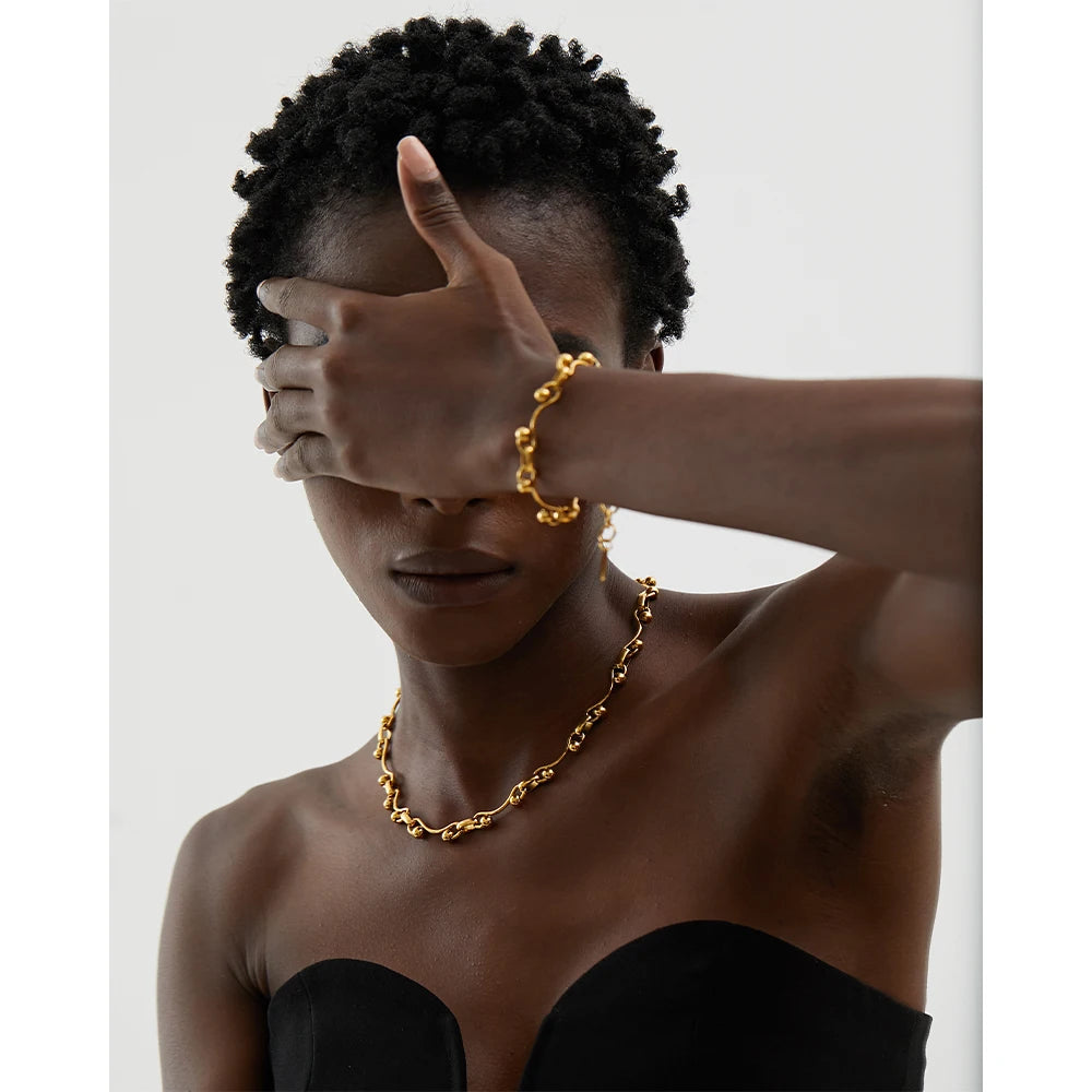 Geometric chain necklace in 18K gold-plated stainless steel.