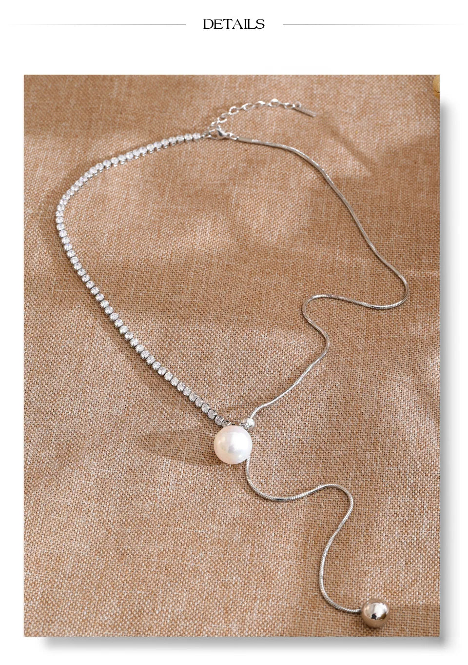 Cubic zirconia pearl geometric necklace in gold-plated stainless steel with pearl and cubic zirconia.
