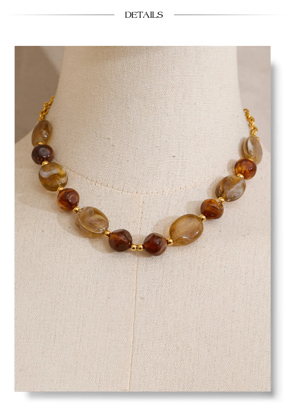 Resin beaded geometric necklace in gold-plated stainless steel with resin.