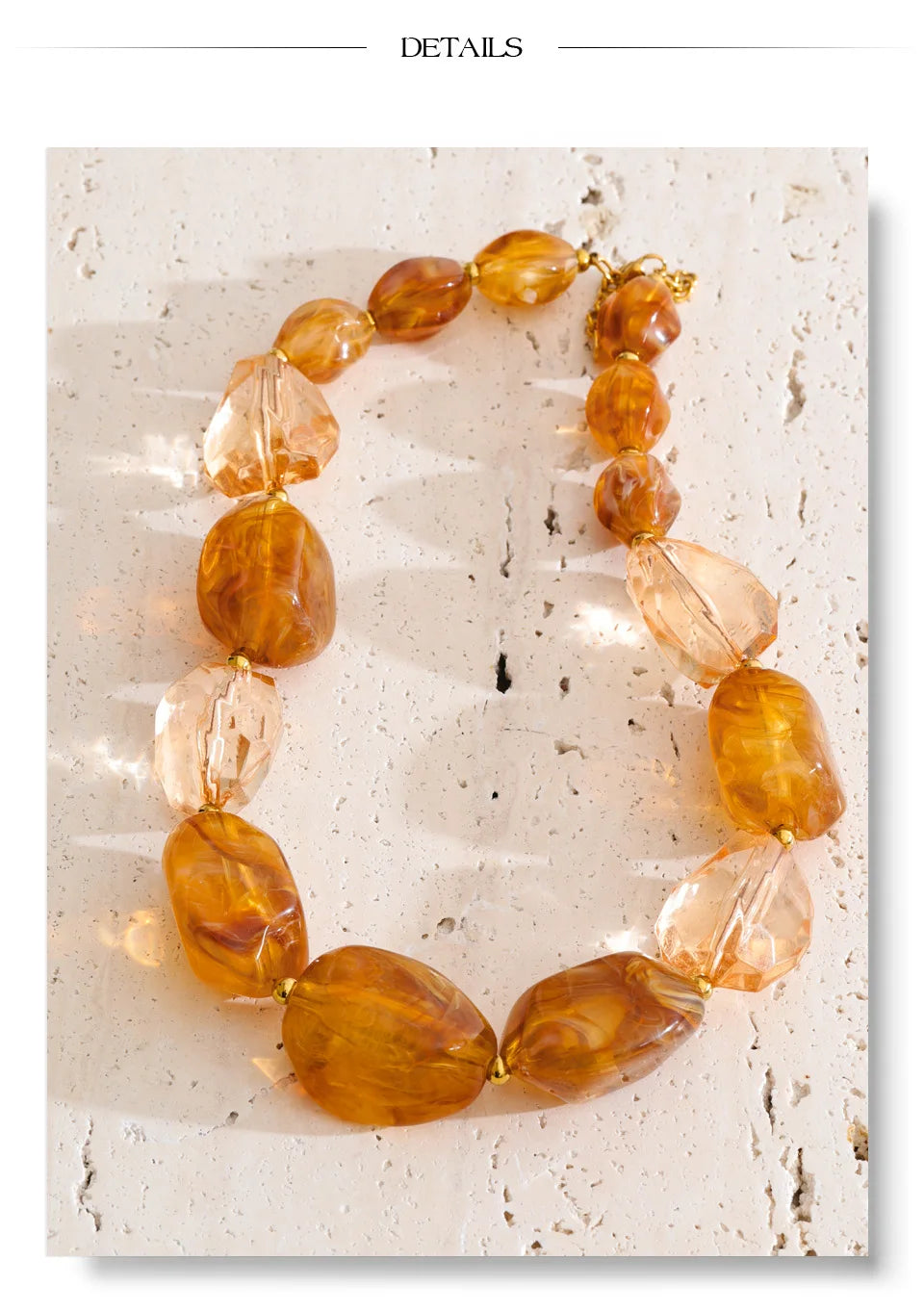Resin acrylic geometric necklace in gold-plated stainless steel with resin and acrylic.