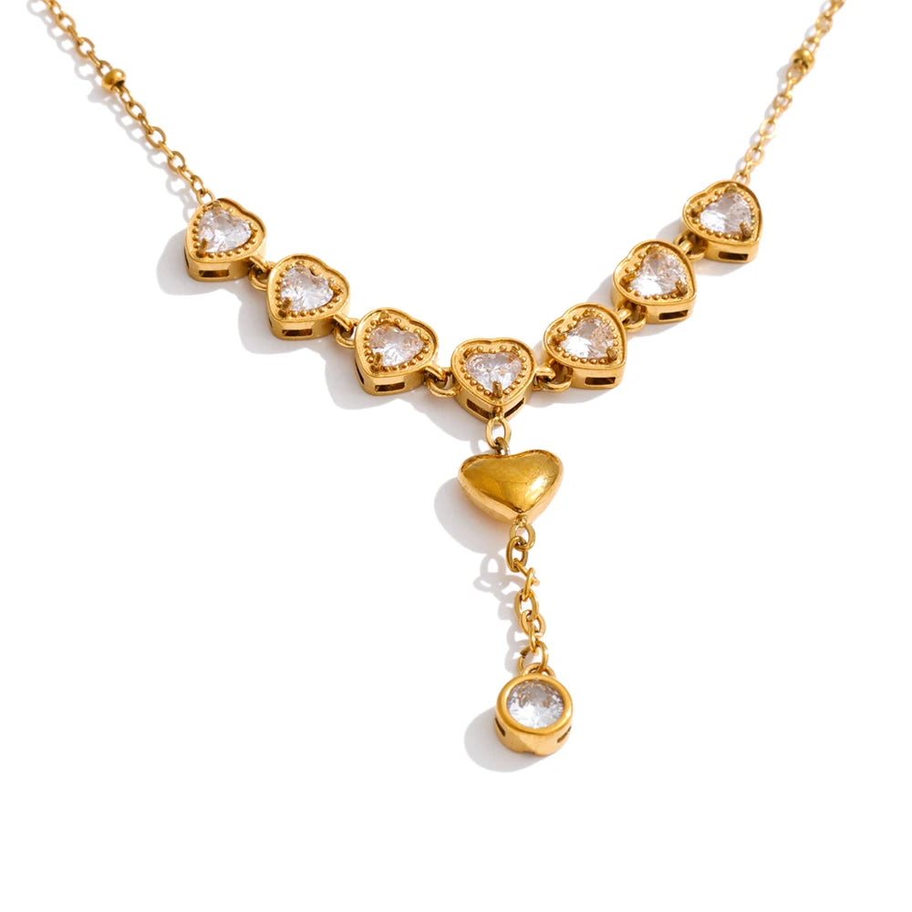 Cubic zirconia heart necklace in gold-plated stainless steel with cubic zirconia.