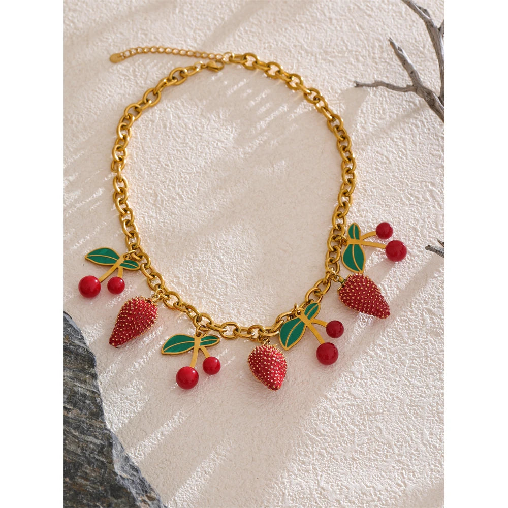 Red acrylic enamel necklace in gold-plated stainless steel with acrylic and enamel.