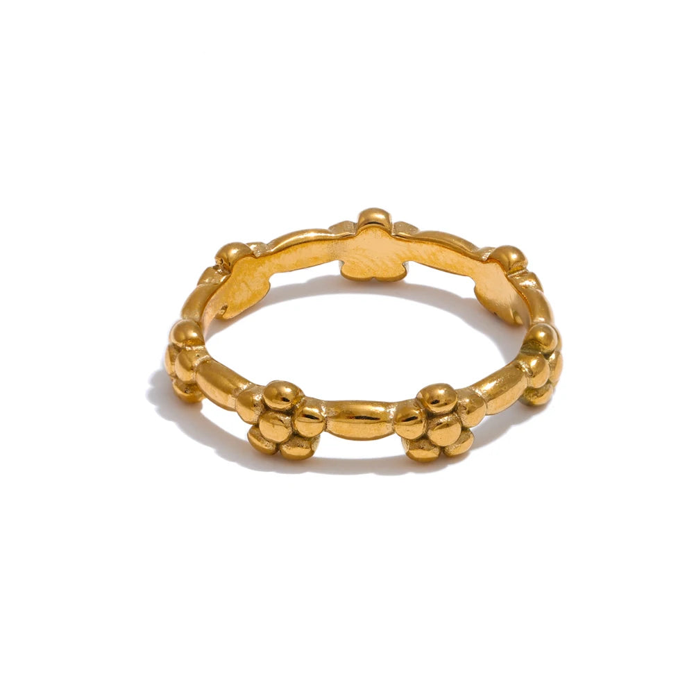 Flower ring in 18K gold-plated stainless steel.