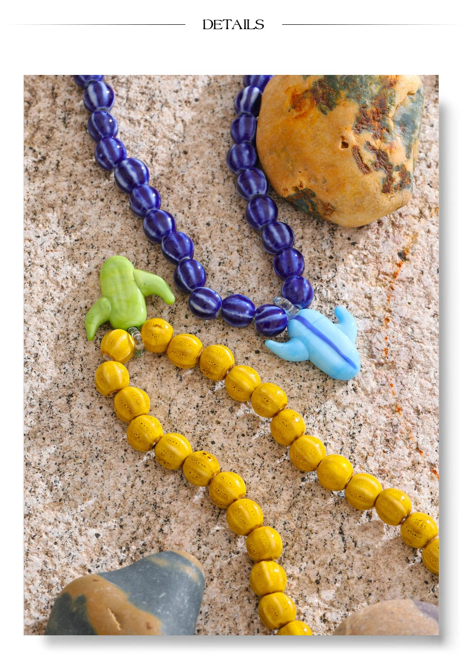 Blue beaded geometric necklace in gold-plated stainless steel.