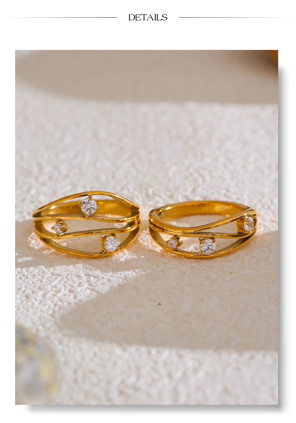 Cubic zirconia geometric ring in 18K gold-plated stainless steel with cubic zirconia.