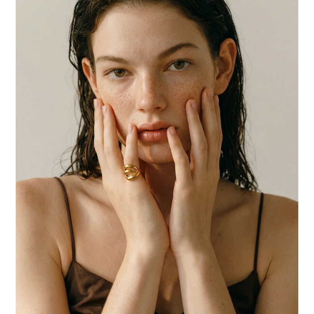 Geometric layered ring in 18K gold-plated stainless steel.