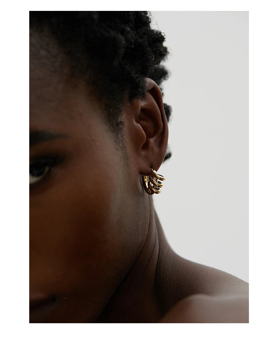 Geometric earrings in gold-plated stainless steel.