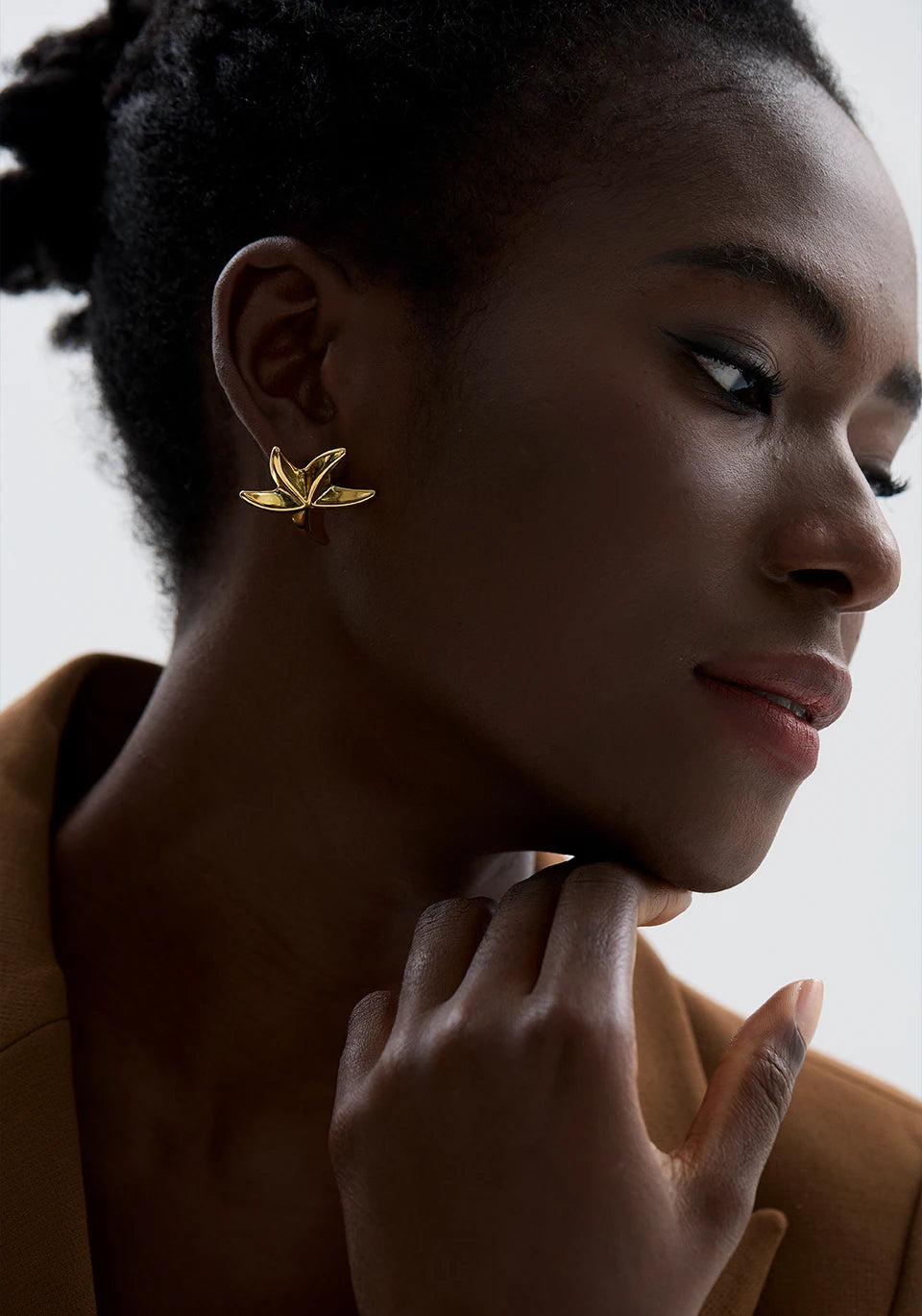 Star earrings in gold-plated 316L stainless steel.