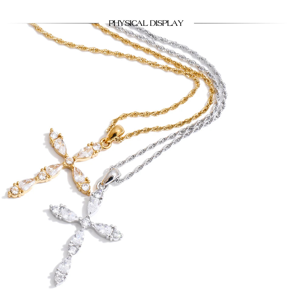 Cubic zirconia cross necklace in gold-plated stainless steel with cubic zirconia.