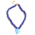 Blue beaded geometric necklace in gold-plated stainless steel.