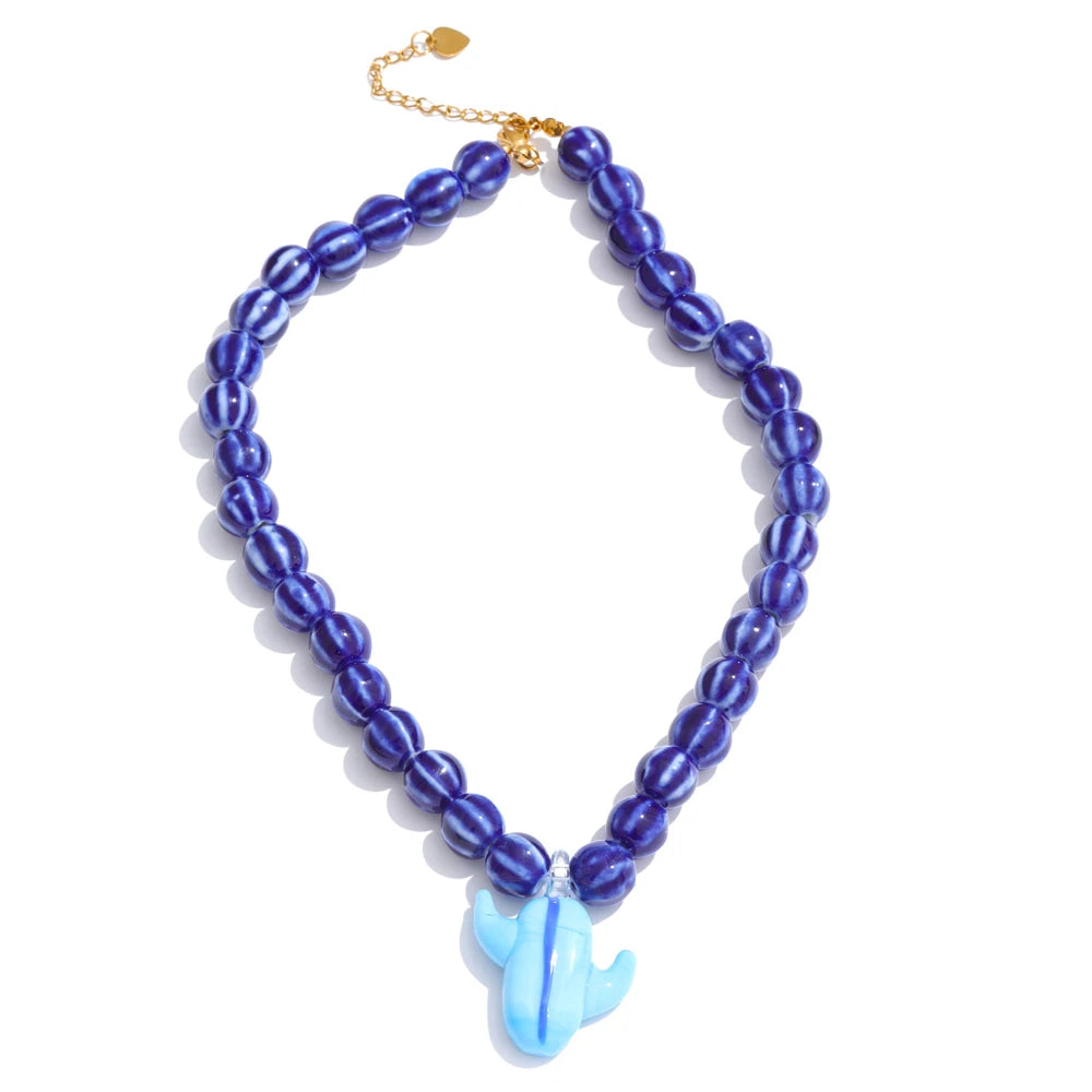 Blue beaded geometric necklace in gold-plated stainless steel.