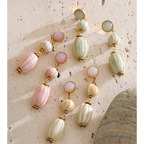 Beaded geometric earrings in gold-plated stainless steel.
