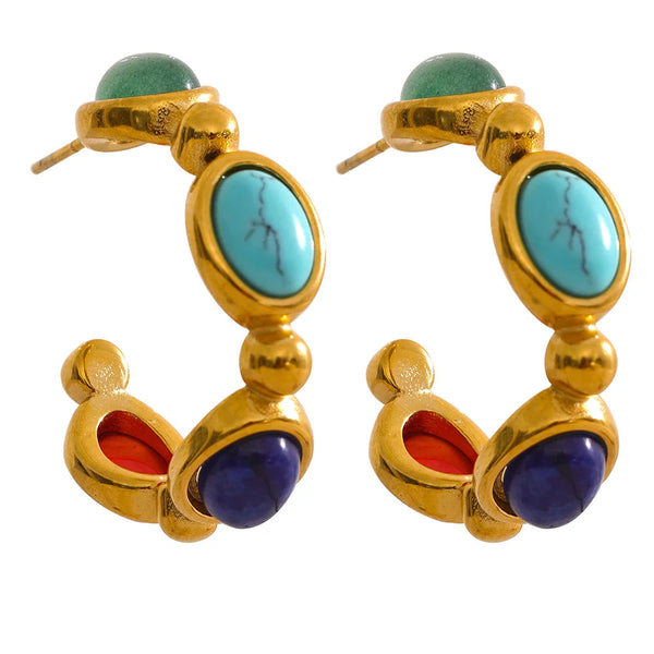 Gold-plated earrings with blue stones and a turquoise centerpiece.