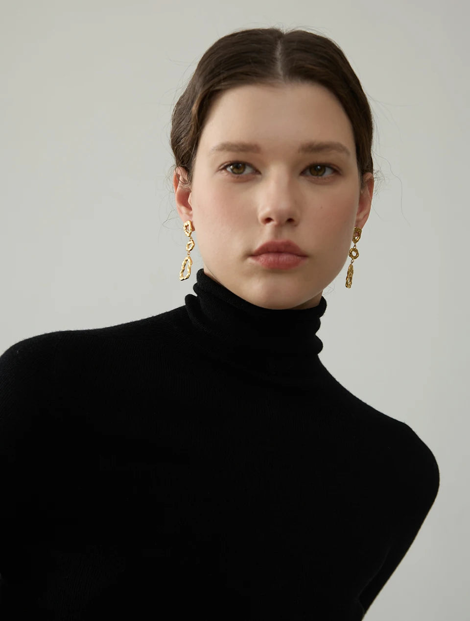 Geometric earrings in gold-plated 316L stainless steel.