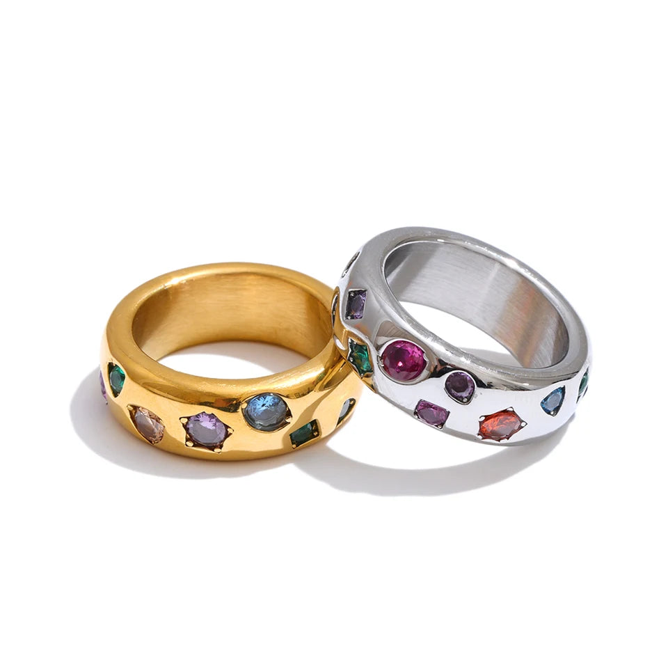Cubic zirconia multi-color geometric ring in 18K gold-plated stainless steel with cubic zirconia.