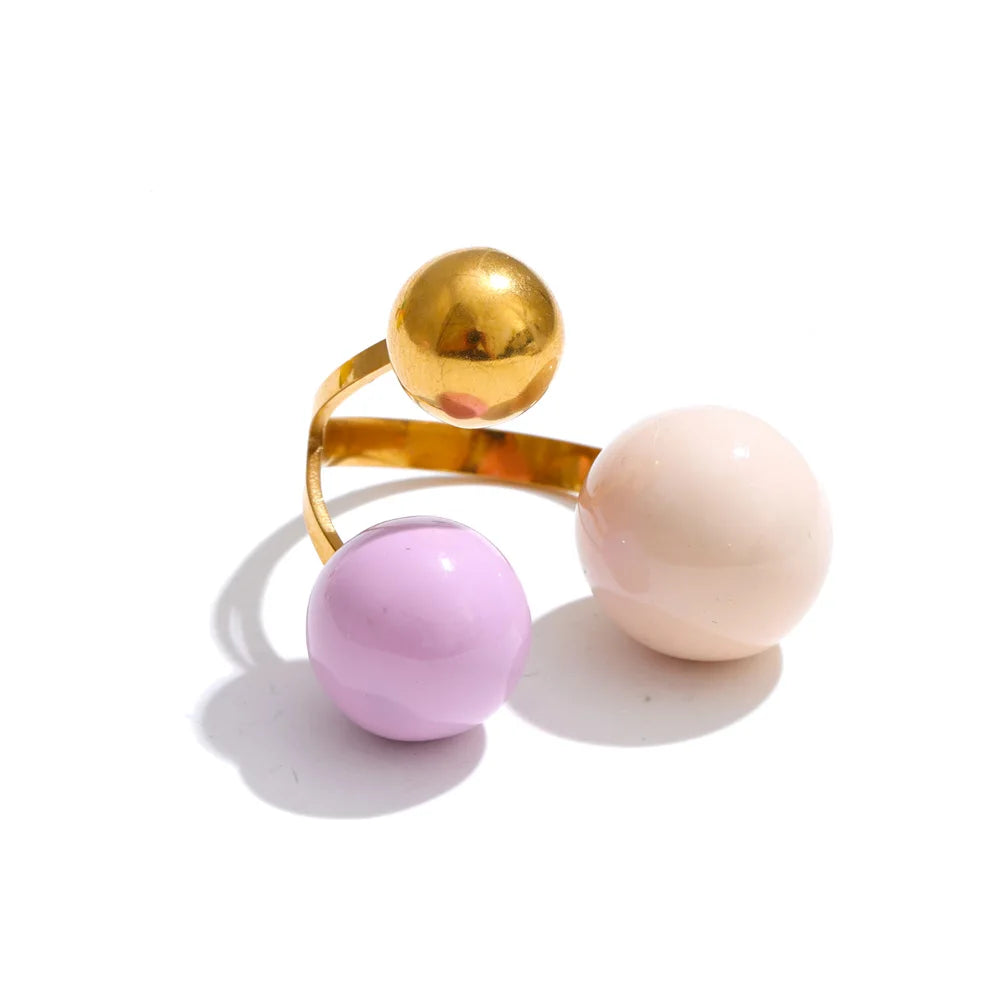 Enamel multi-color geometric ring in 18K gold-plated stainless steel with enamel.