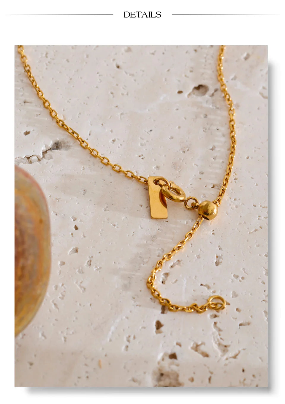 Cubic zirconia multi-color geometric necklace in gold-plated stainless steel with cubic zirconia.