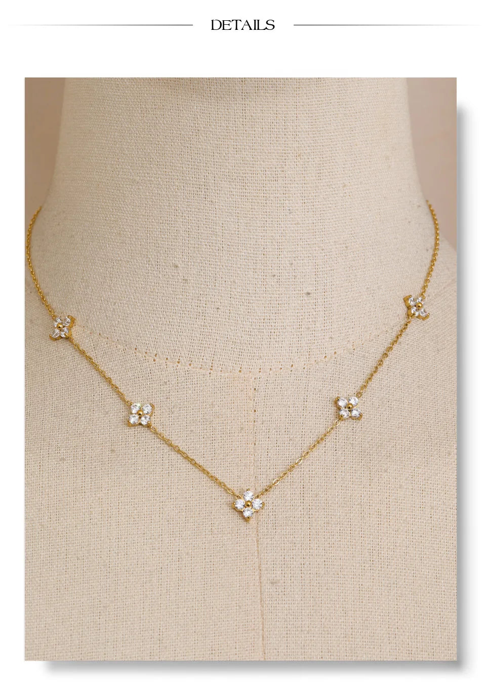 Cubic zirconia flower chain necklace in gold-plated stainless steel with cubic zirconia.