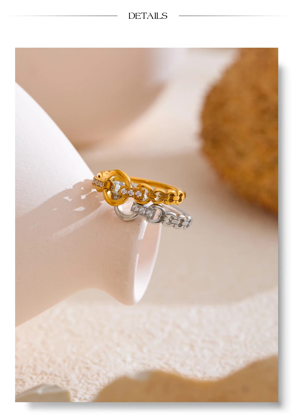 Cubic zirconia geometric ring in gold-plated stainless steel with cubic zirconia.