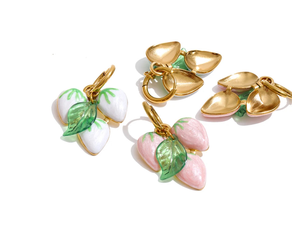 White geometric earrings in gold-plated stainless steel.