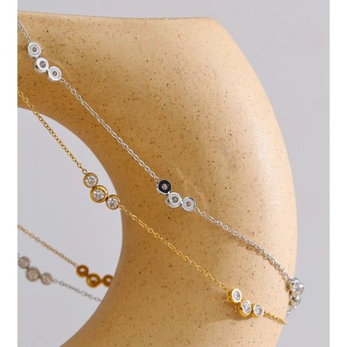 Cubic zirconia geometric chain necklace in gold-plated stainless steel with cubic zirconia.