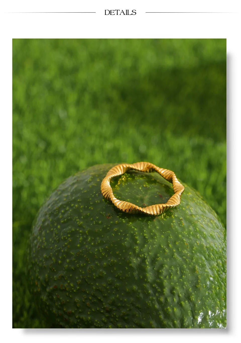 Geometric ring in 18K gold-plated stainless steel.