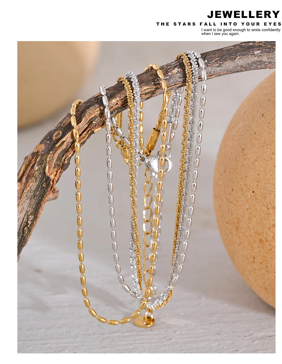 Geometric chain layered necklace in gold-plated stainless steel.