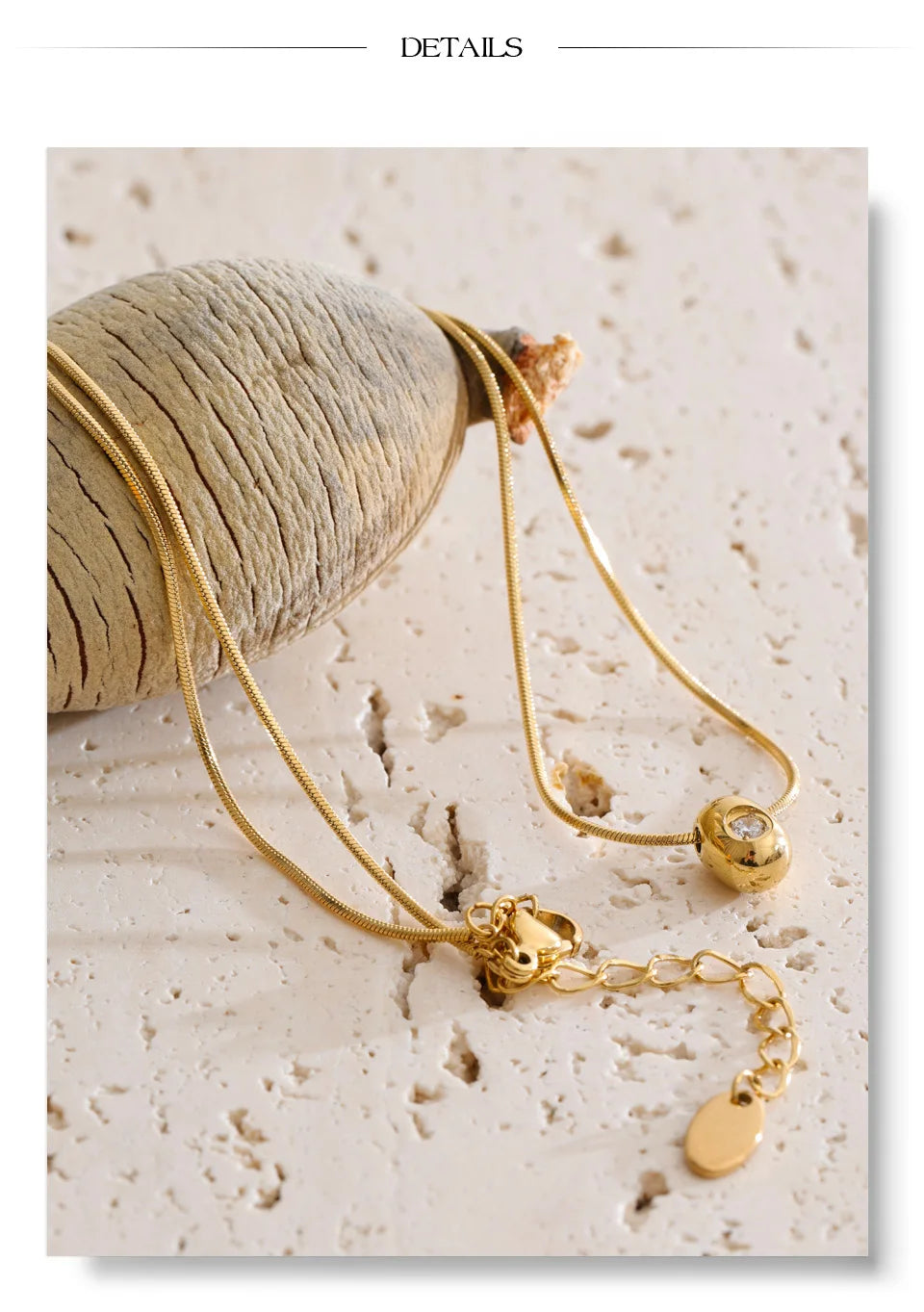Cubic zirconia geometric necklace in gold-plated stainless steel with cubic zirconia.