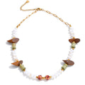 Shell beaded geometric necklace in gold-plated stainless steel with shell.