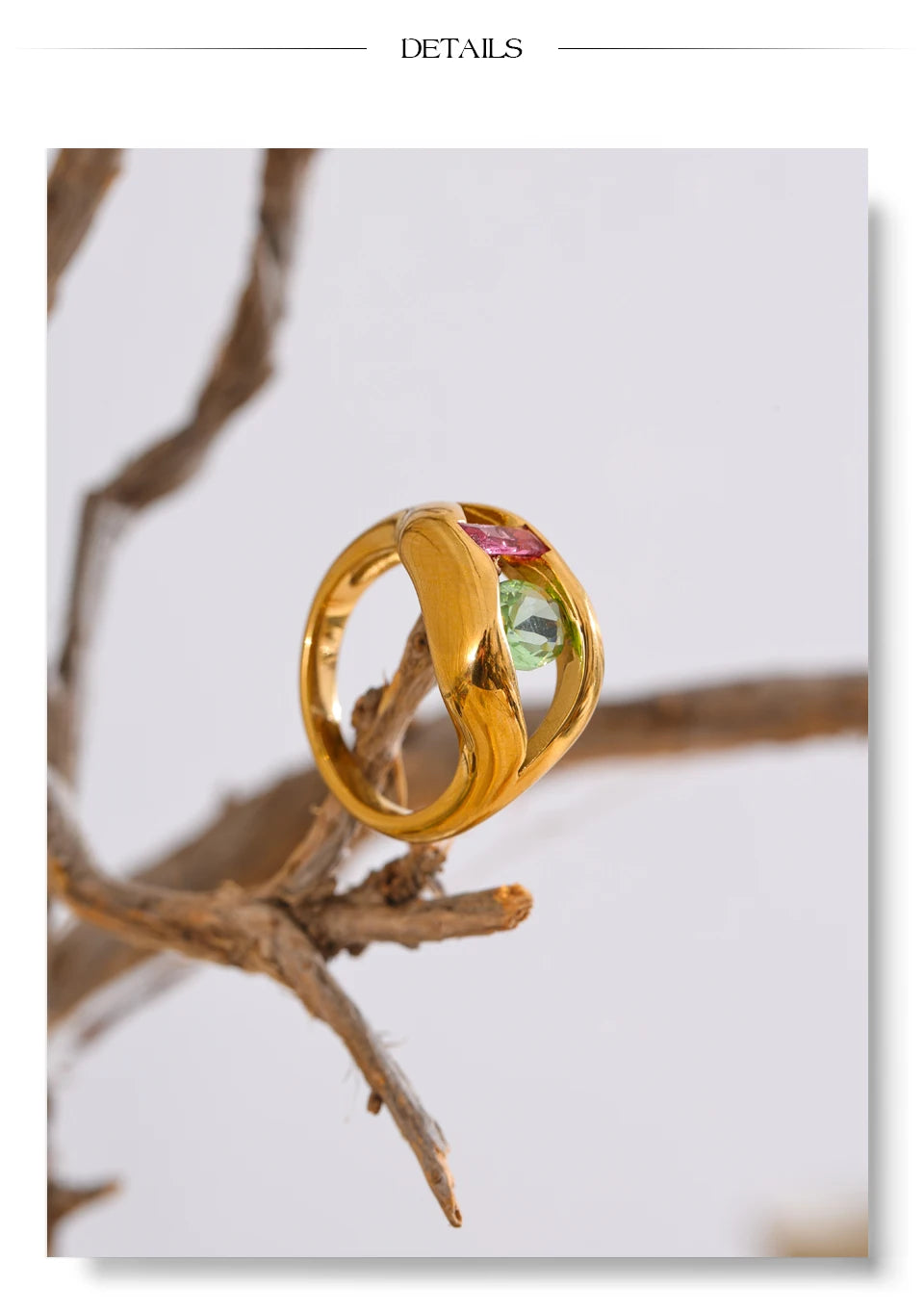 Cubic zirconia geometric ring in 18K gold-plated stainless steel with cubic zirconia.