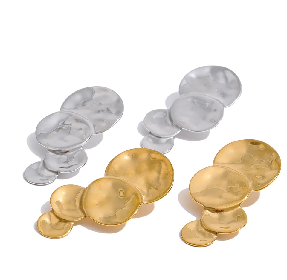 Geometric earrings in gold-plated stainless steel.