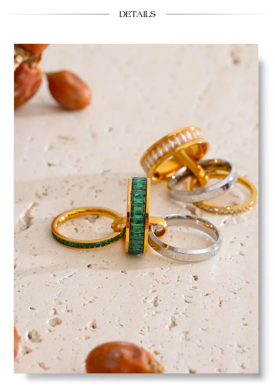 Cubic zirconia geometric layered ring in 18K gold-plated stainless steel with cubic zirconia.