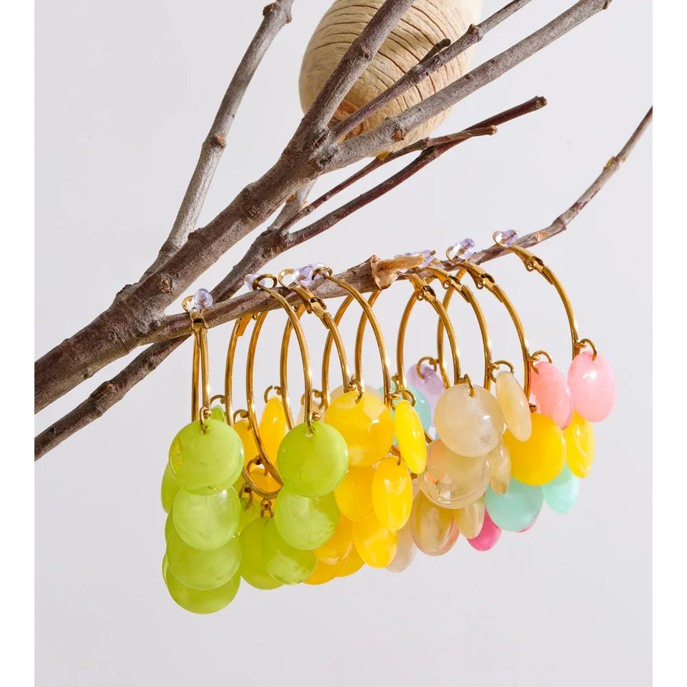 Resin multi-color geometric earrings in gold-plated stainless steel with resin.