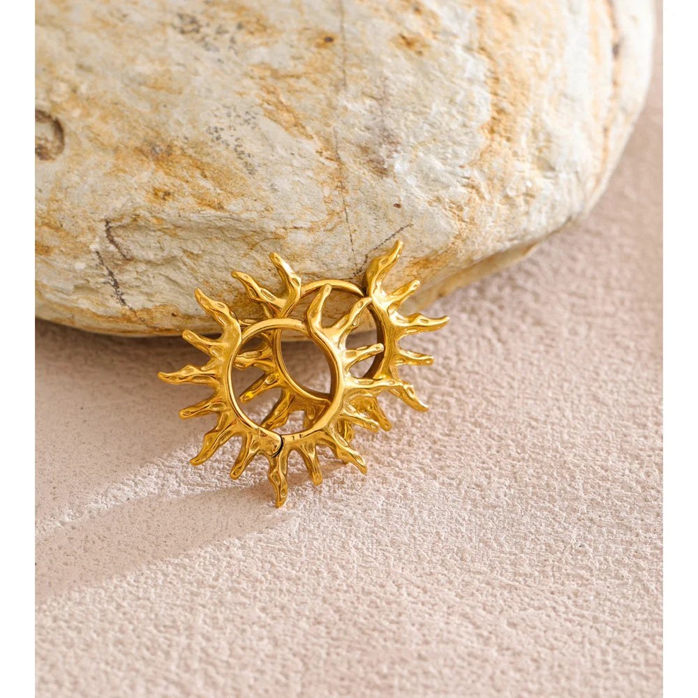 Star sun hammered earrings in gold-plated stainless steel.