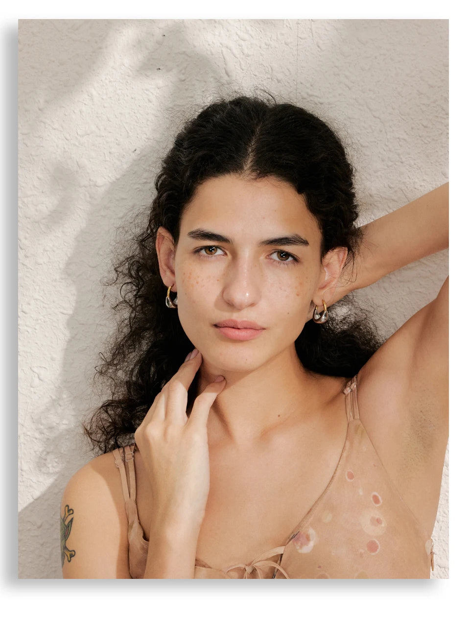Geometric earrings in gold-plated stainless steel.