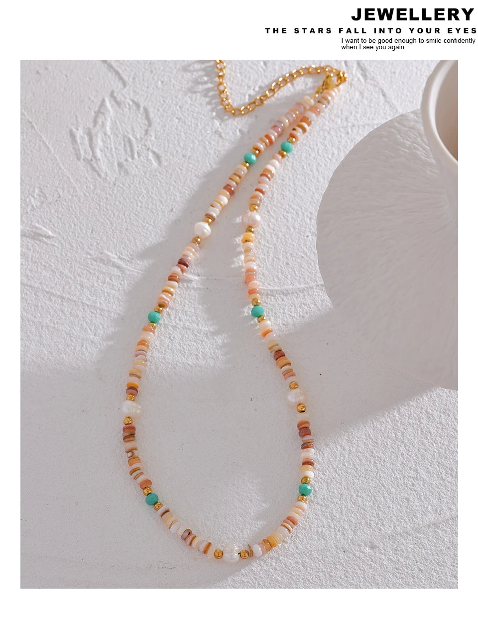 Freshwater pearl natural stone beaded necklace in gold-plated stainless steel with freshwater pearl and natural stone.