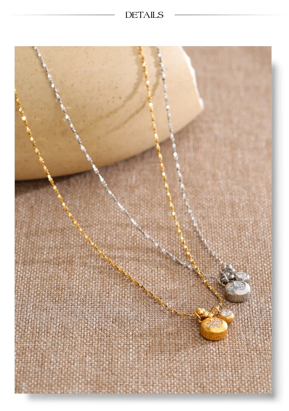 Cubic zirconia heart geometric necklace in gold-plated stainless steel with cubic zirconia.
