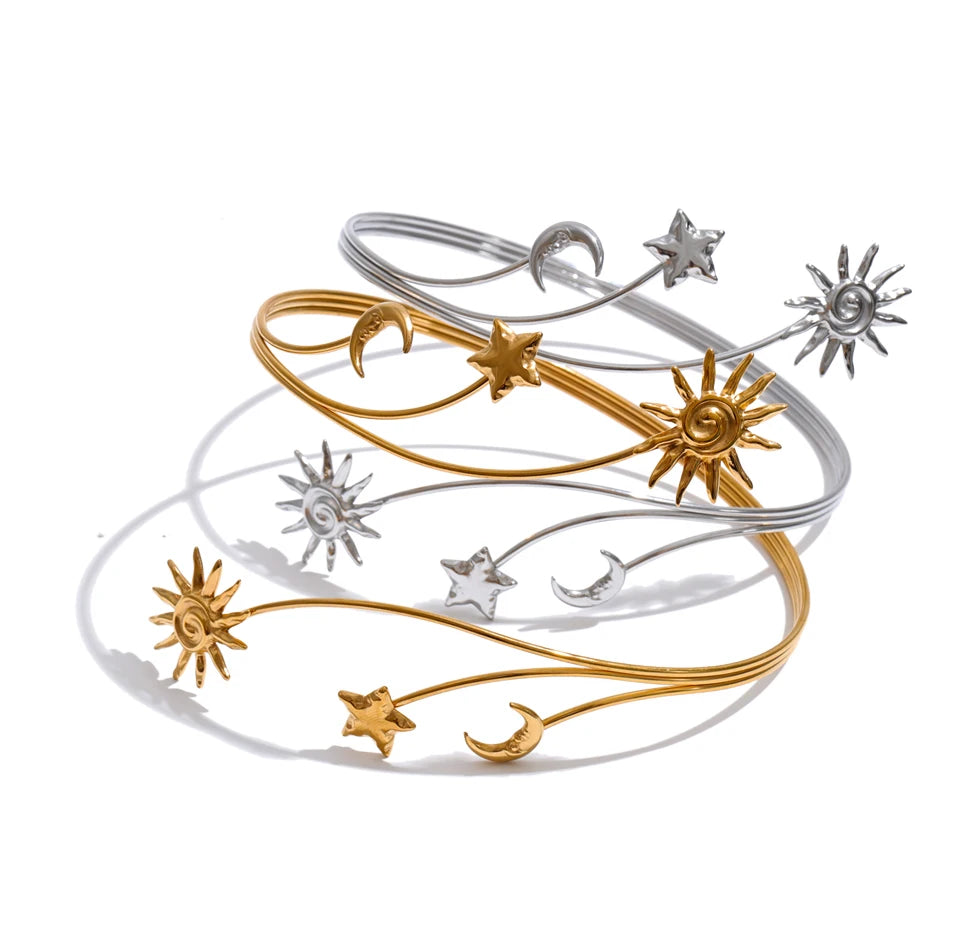 Star moon sun bracelet in gold-plated stainless steel.