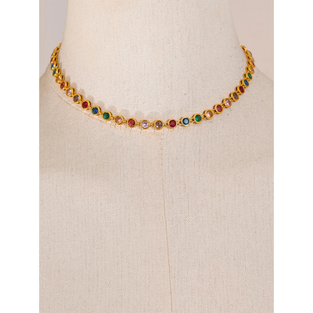 Cubic zirconia multi-color geometric necklace in gold-plated stainless steel with cubic zirconia.