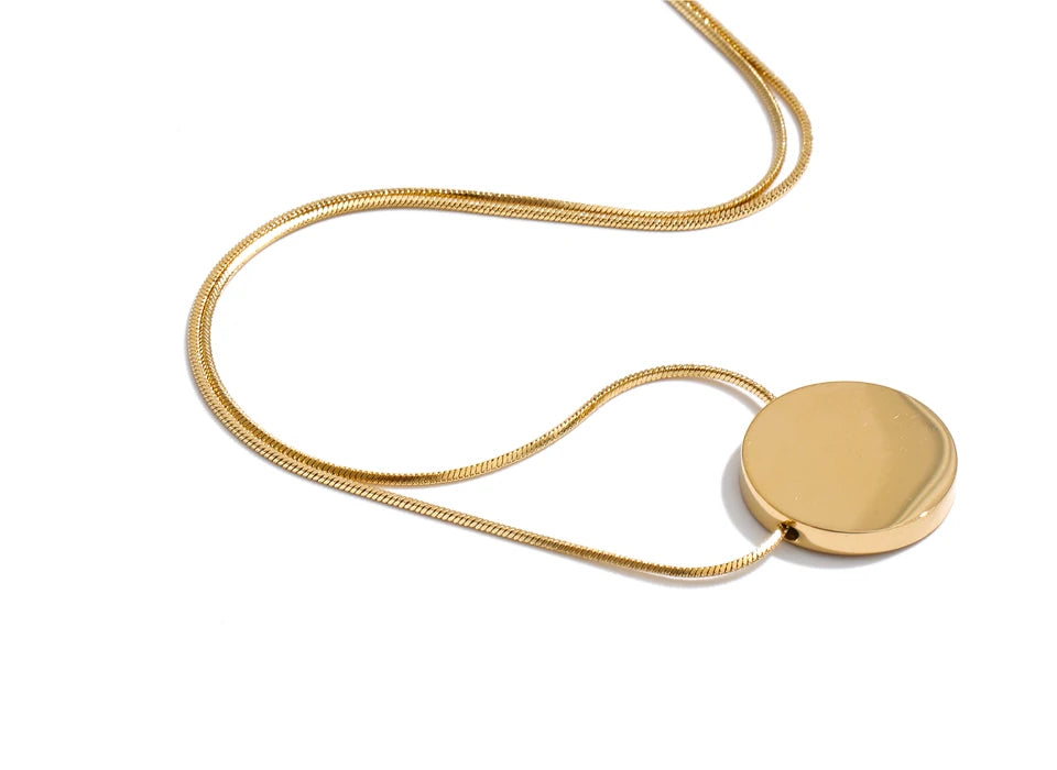 Coin geometric necklace in gold-plated stainless steel.