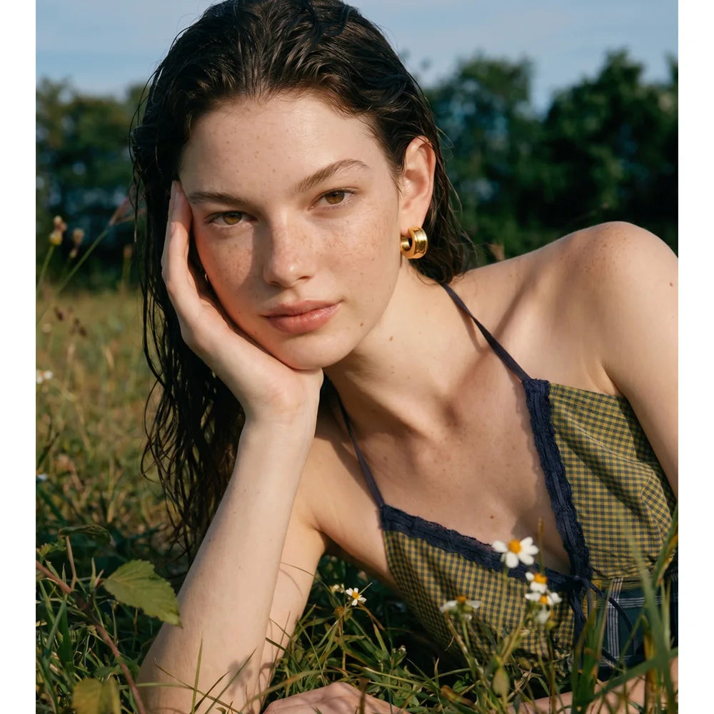 Geometric earrings in gold-plated stainless steel.
