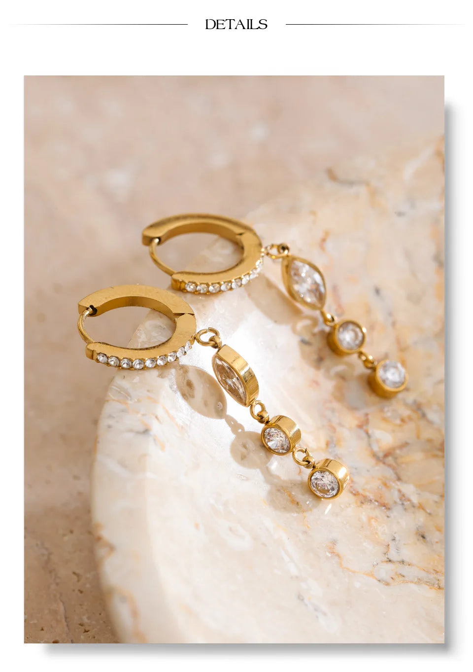 Cubic zirconia geometric chain earrings in gold-plated stainless steel with cubic zirconia.
