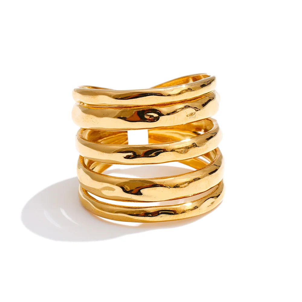 Geometric layered ring in 18K gold-plated stainless steel.