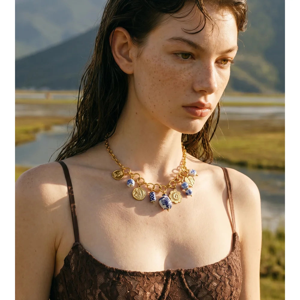 Heart flower star necklace in gold-plated stainless steel.