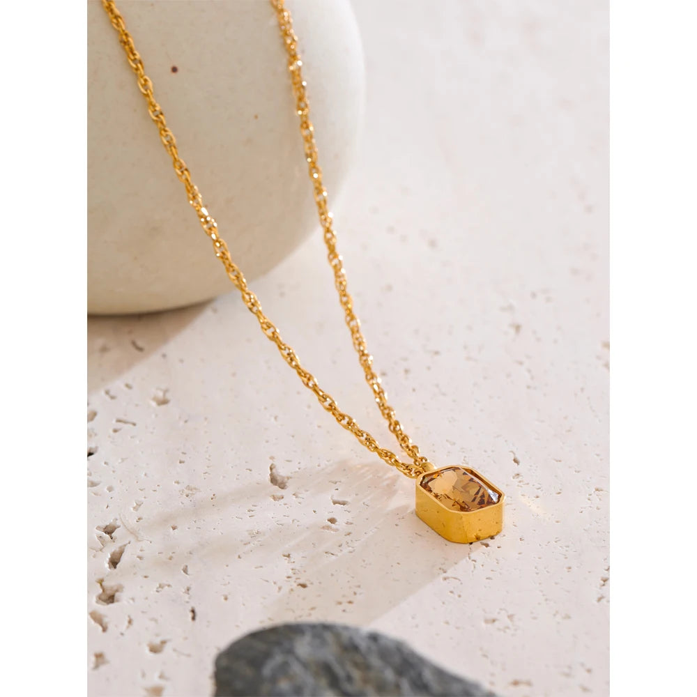 Cubic zirconia geometric necklace in gold-plated stainless steel with cubic zirconia.