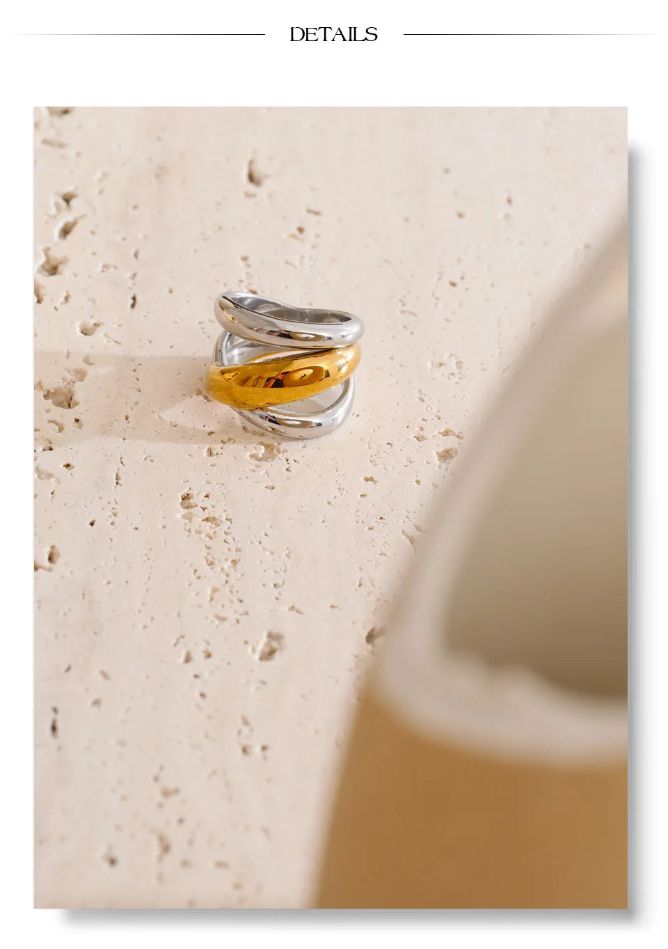 Geometric layered ring in 18K gold-plated stainless steel.