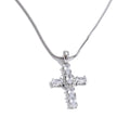 Cubic zirconia cross necklace in gold-plated stainless steel with cubic zirconia.