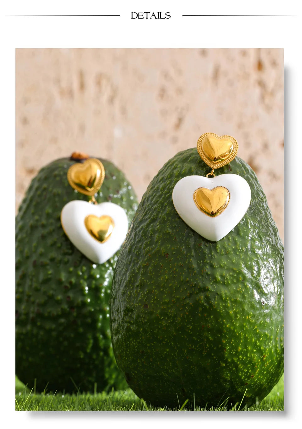 White enamel heart earrings in gold-plated stainless steel with enamel.