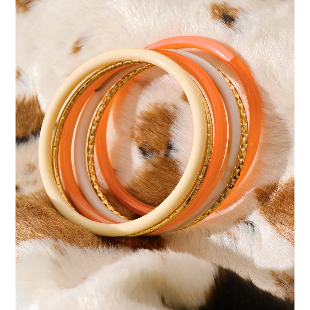 Resin multi-color geometric bracelet in gold-plated stainless steel with resin.